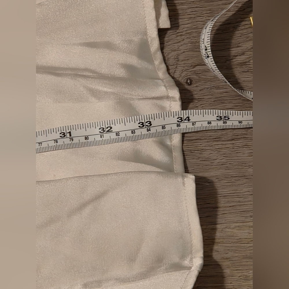 Express satin puff sleeve ruffle mini dress in a cream color. - Picture 6 of 9